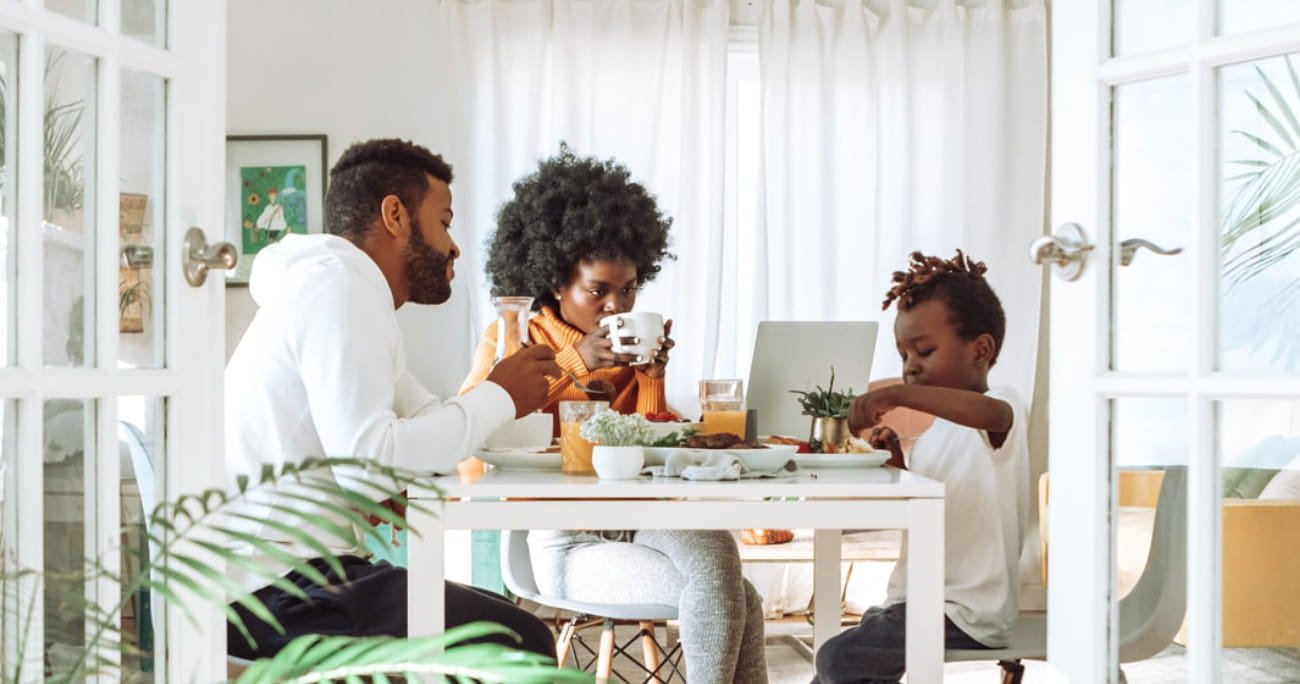 family enjoying breakfast together
